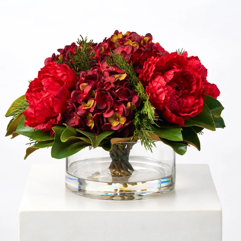 Holiday Affair - Christmas Red Peony, Burgundy Hydrangea with Real Touch Magnolia & Cedar Winter Water Illusion Centerpiece Arrangement