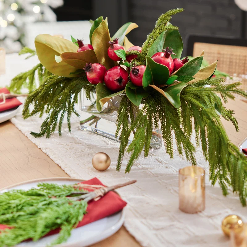 Lifelike Red Pomegranate, Real Touch Magnolia Leaves, & Norfolk Pine Holiday Arrangement in Oval Vase Christmas Centerpiece